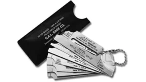 The image shows a close-up of a metal fillet gauge used for welding inspection, likely a Best 10 Welding Fillet Gauge Aws Standard.