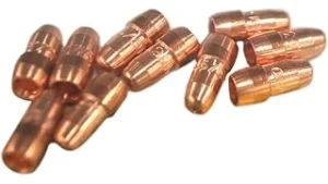 The image shows many individual welding contact tips neatly arranged in a bulk packaging display.