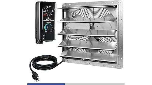 This image shows powerful industrial fans set up to clear smoke and fumes in a workshop.