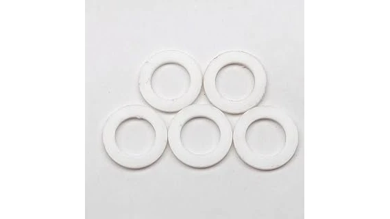 The image shows a collection of essential nozzle insulator rings for MIG welding, featured in a top 10 list.