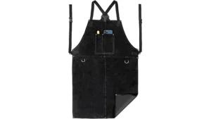 The image shows a person wearing a heavy-duty leather welding apron, showcasing quality craftsmanship for top welding aprons.