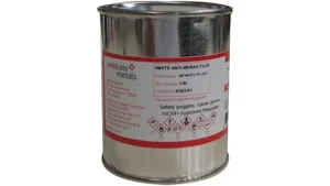 The image shows a collection of various welding and brazing flux powders in containers.