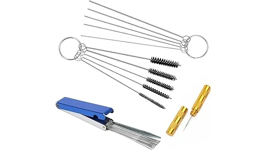 The image shows various welding contact tip cleaners, essential tools for maintaining welding equipment.