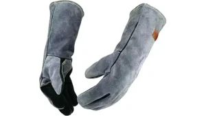 The image shows a hand wearing a durable welding glove, ideal for precision work.