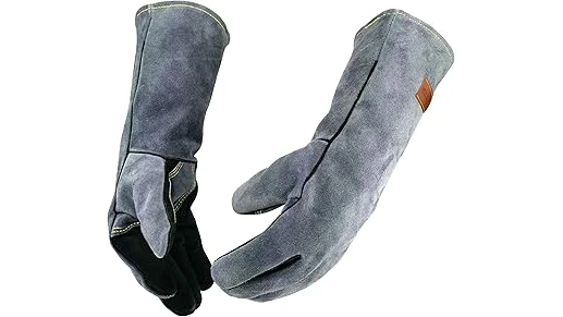 The image shows a hand wearing a durable welding glove, ideal for precision work.