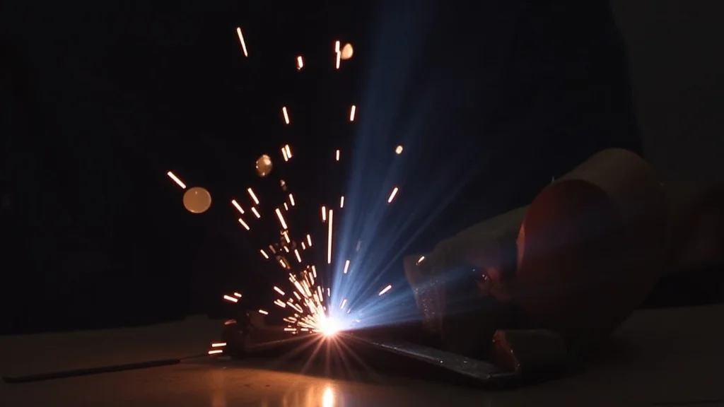 The image shows a Tig welder setup with a connection point that might be the source of a gas leak issue.