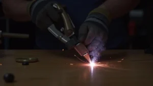 The image shows a close-up of a Tig welder torch tip, possibly indicating a common issue and quick fix.