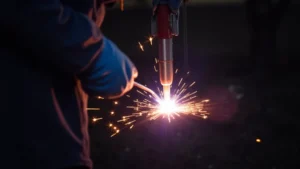 The image shows a close-up of a TIG welding arc, illustrating potential causes of arc fluctuations.